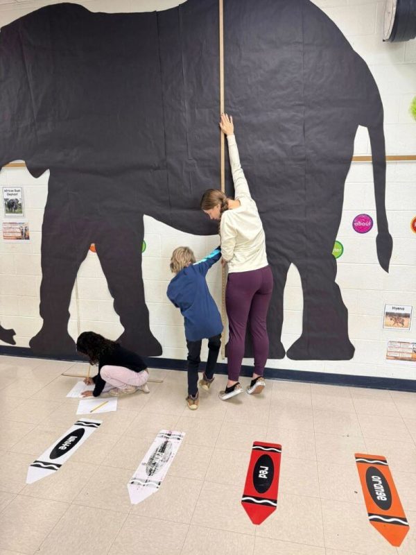 Teacher doing an elephant activity with student