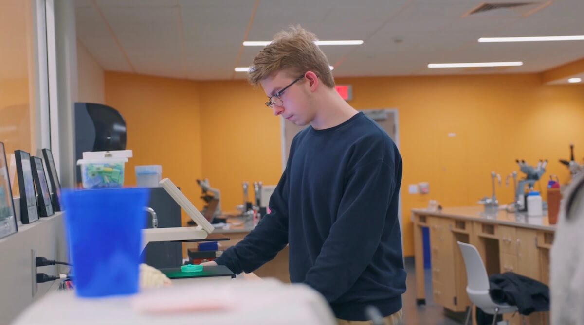 Teen in a science lab